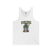 DailyThreadCo white cotton tank top with a graphic of a raccoon in a trash can and the text 