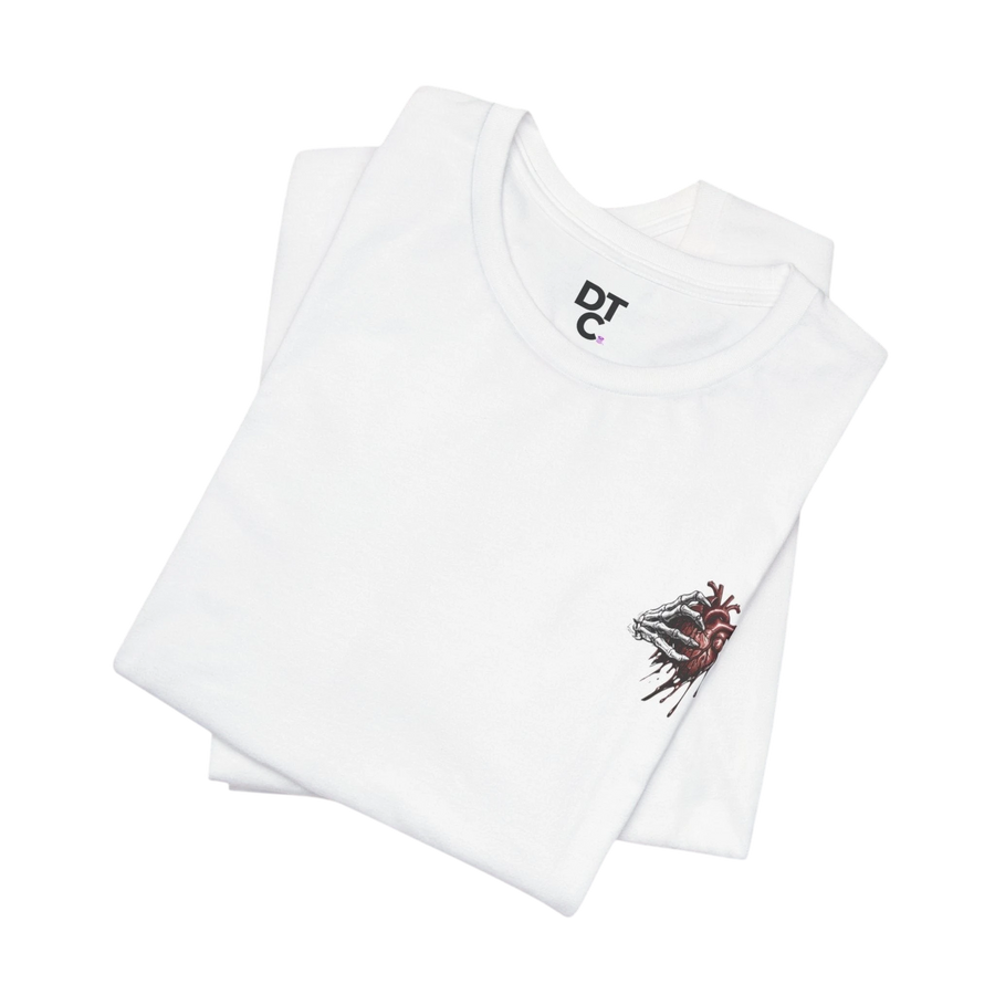 DailyThreadCo white 100% cotton t-shirt with a small graphic of a skeletal hand holding a dripping anatomical heart on the left chest.