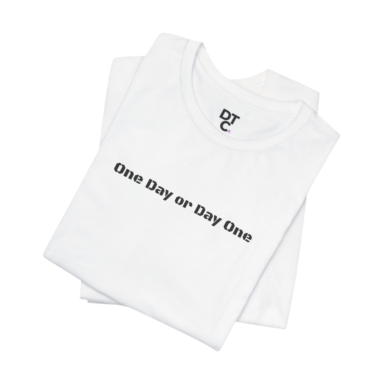 DailyThreadCo. white 100% cotton crew neck t-shirt with black "One Day or Day One" graphic.